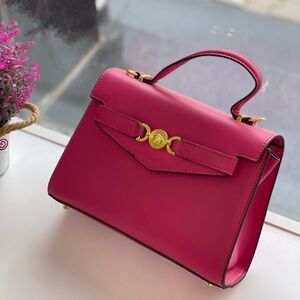 Elegant Fuchsia Satchel with Gold Details